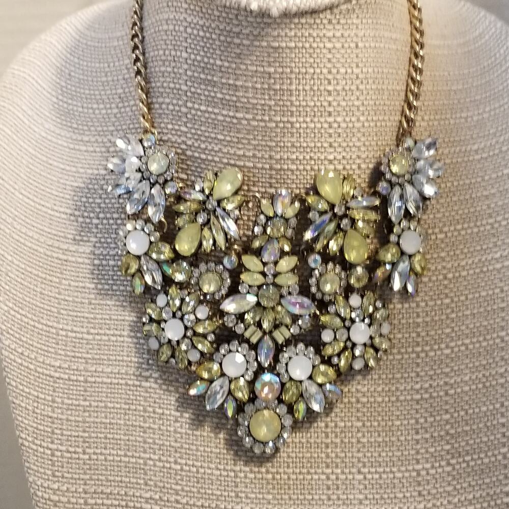 Gold tone chain bib necklace 14 inches with a two inch extension rhinestones